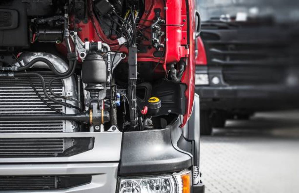 Why is it critical for an engine's oil and oil filter to be serviced regularly